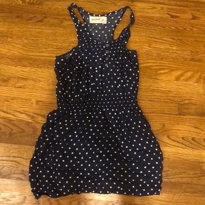 A blue dress with white polkadots